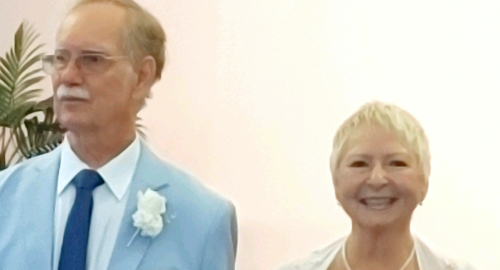 smiling bride and groom